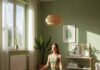 5 Solo Activities That Will Help You Recharge and Refocus Meditating in sunlit green room.