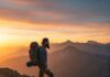 Best Backpacking Routes in North America for Adventure Lovers Backpacker at sunrise mountain vista