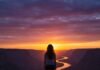 Why Solo Travel Should Be on Your Bucket List in 2025 Solo Traveler at Sunset: Adventure & Freedom