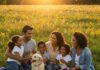 The Best Outdoor Family Activities for Active Families Diverse family laughing at sunny meadow picnic.